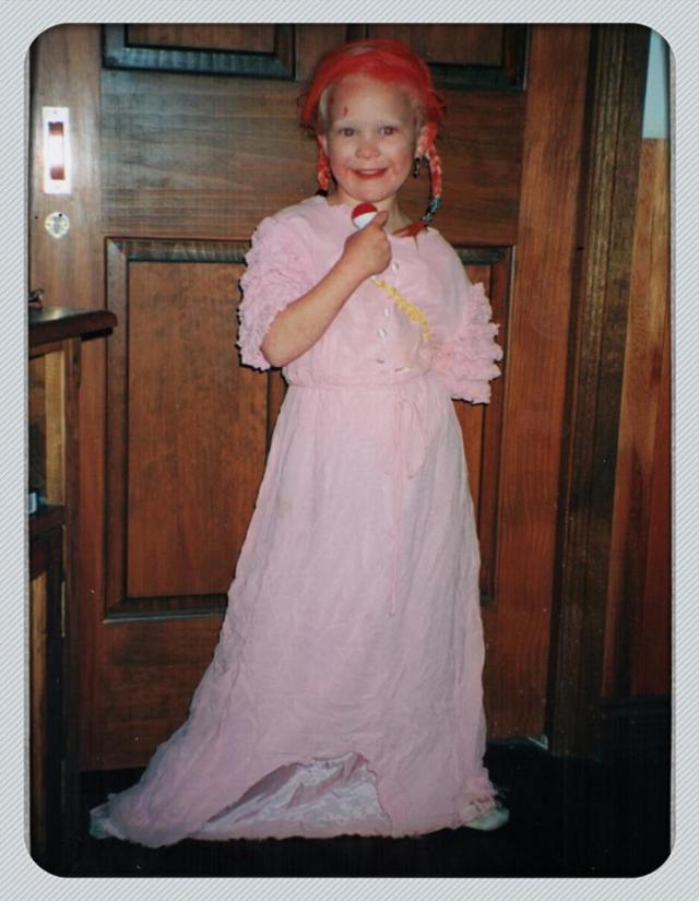 This is a photo taken by my mother of me 'singing' when I was 5 years old.