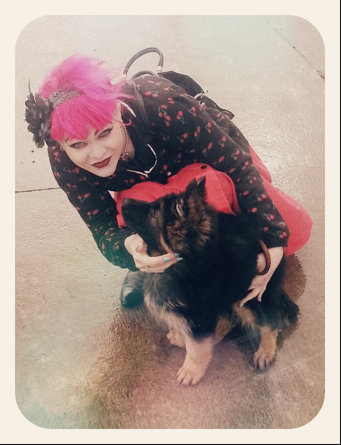 Photo taken by Cody Chance Holley at Dodge's first puppy class. If you think that winged eyeliner is challenging, try doing it whilst in the car with a German Shephard puppy jumping all over you! 